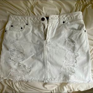 torn white jean skirt